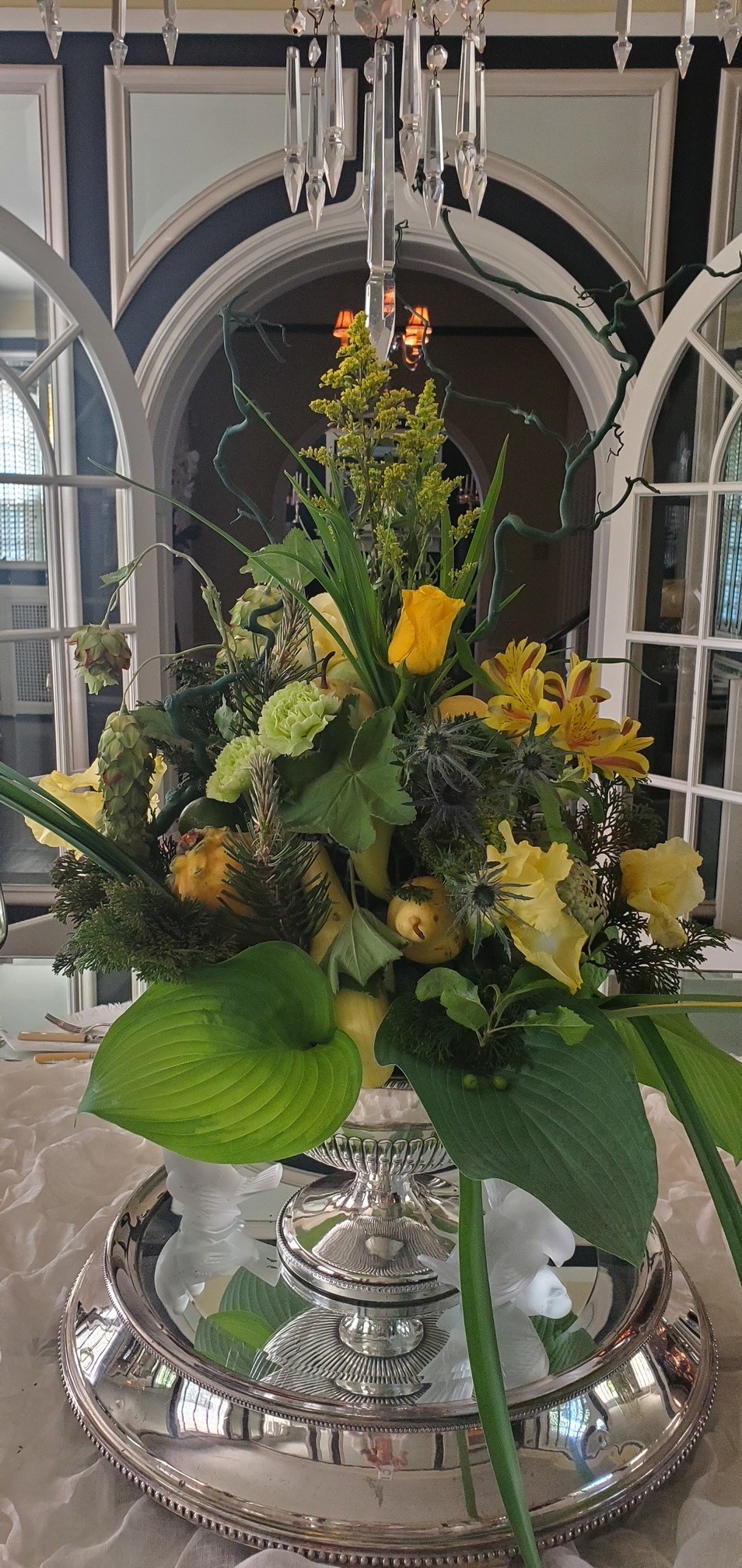 Tall yellow flower arrangement